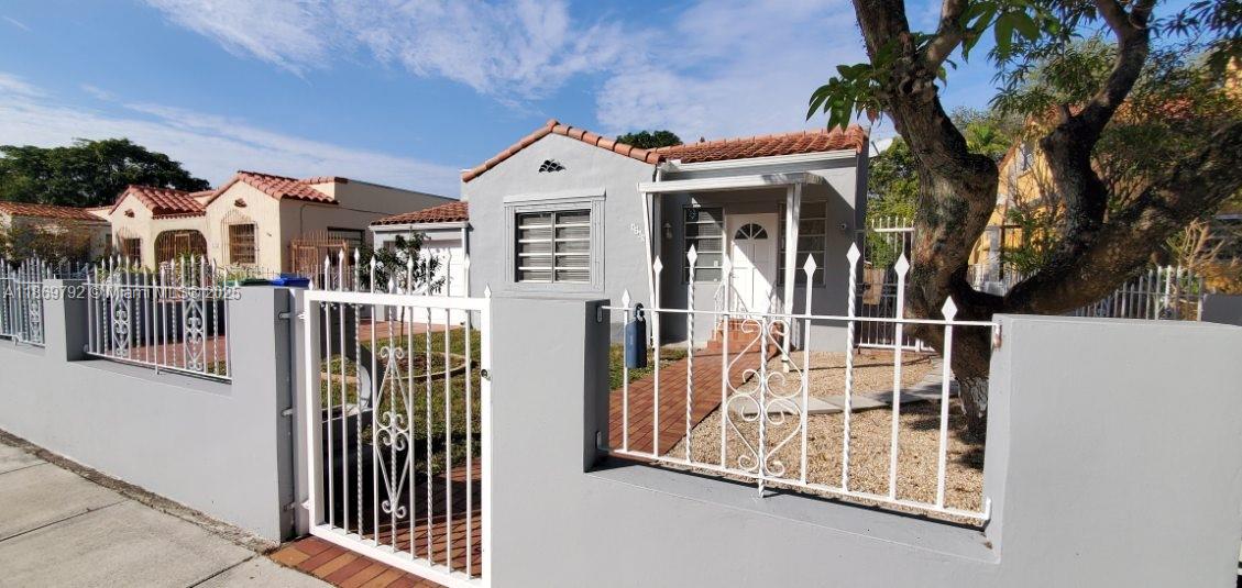 CLASSIC MIAMI HOME, TASTEFULLY UPDATED, 3 BED 2 BATH WITH OPEN FLOOR PLAN AND FULL GARAGE. WOODLOOK CERAMIN TILE THROUGHOUT, UPDATED KITCHEN AND BATHROOMS, NICE SIZED BACK YARD. MINUTES FROM DOWNTOWN AND BRICKELL