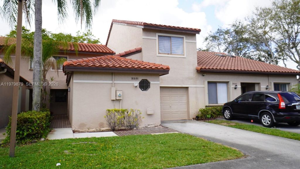 Photo of 3251 W Inverrary Blvd W, Lauderhill, FL 33319 (MLS # A11979879)