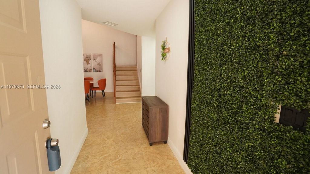 Photo of 3251 W Inverrary Blvd W, Lauderhill, FL 33319 (MLS # A11979879)