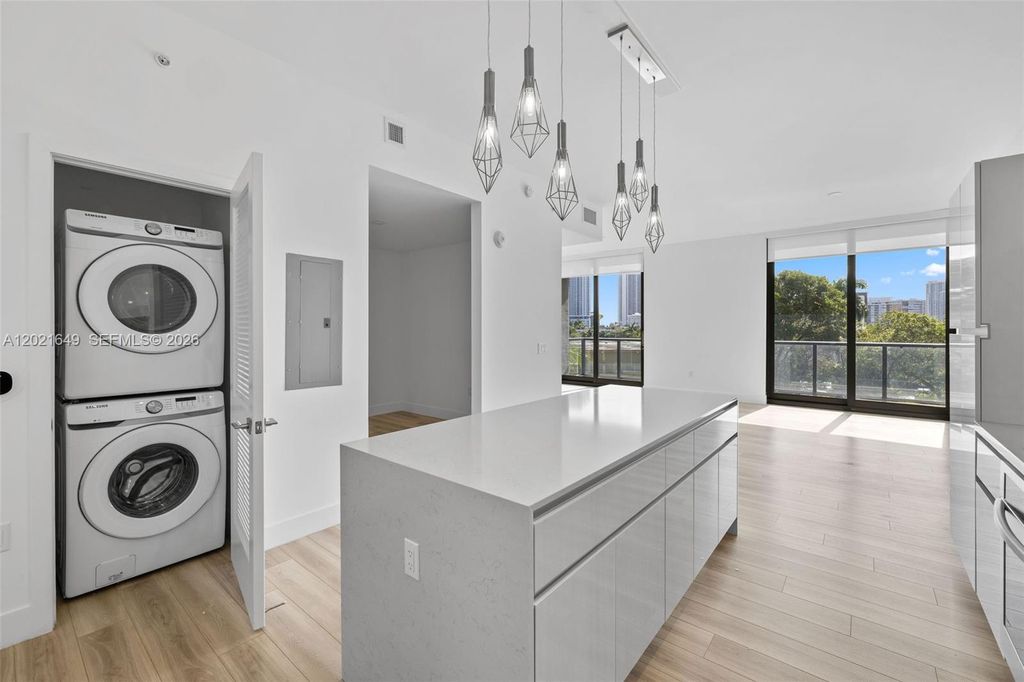 Photo of 101 Diplomat Pkwy #204, Hallandale Beach, FL 33009 (MLS # A12021649)