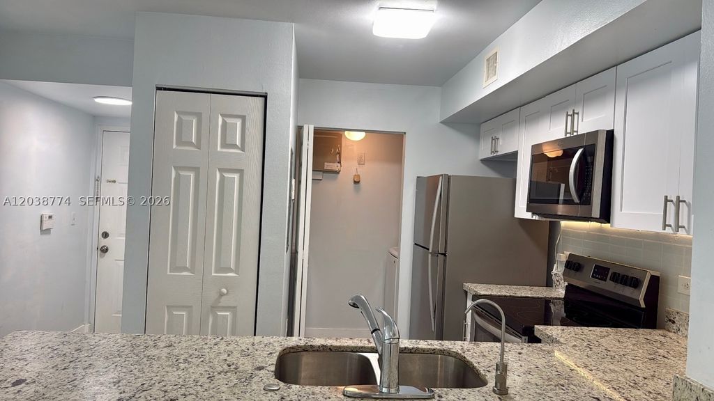Photo of 11155 SW 5th Pl #302, Pembroke Pines, FL 33025 (MLS # A12038774)