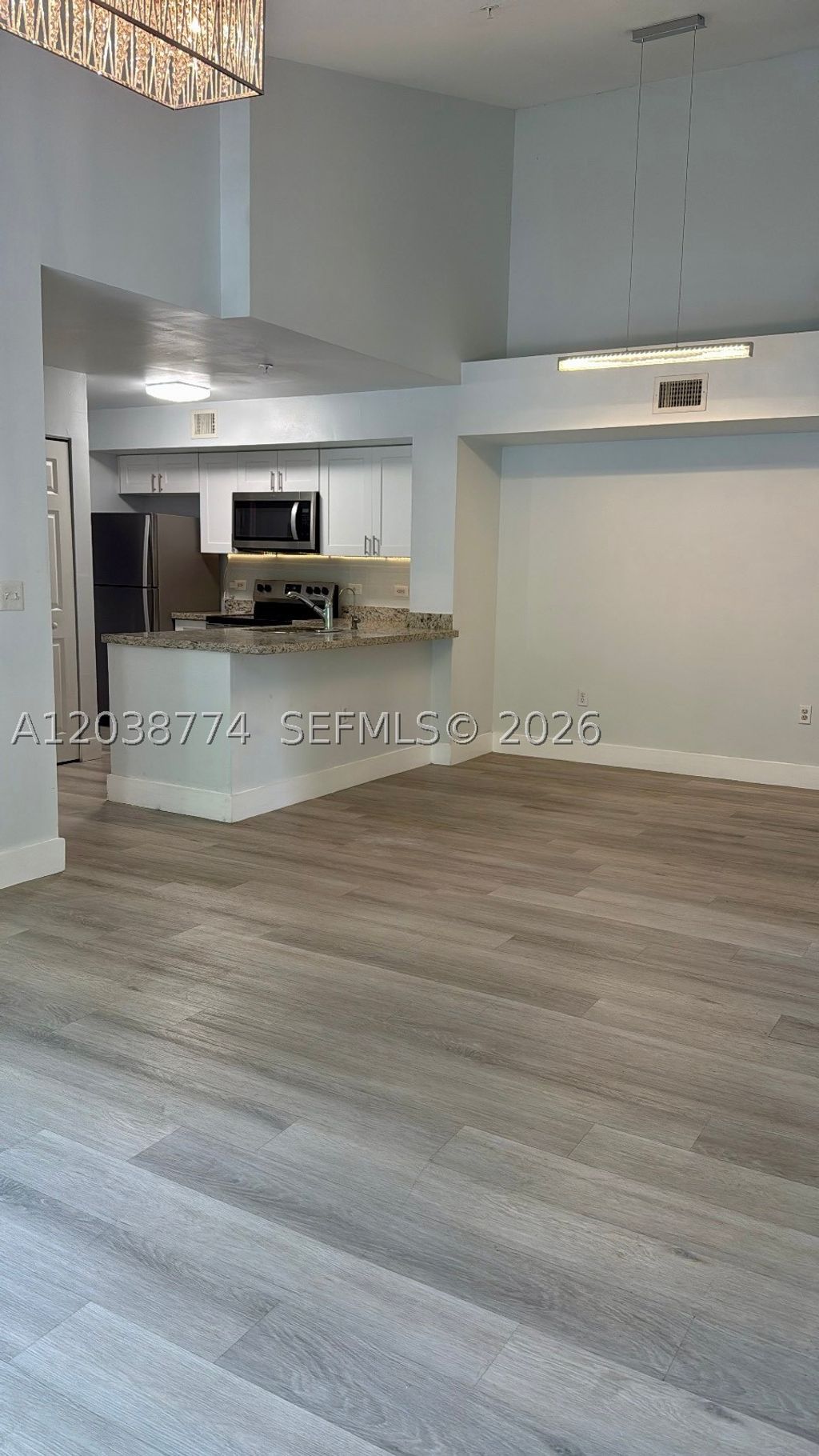 Photo of 11155 SW 5th Pl #302, Pembroke Pines, FL 33025 (MLS # A12038774)