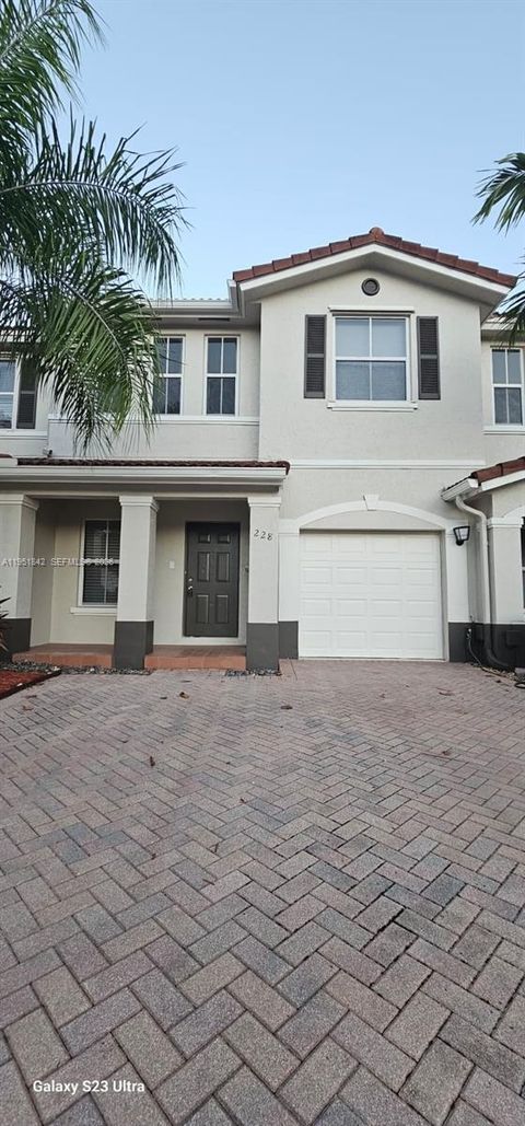 Photo of 228 Riverwalk Cir, Sunrise, FL 33326 (MLS # A11951842)