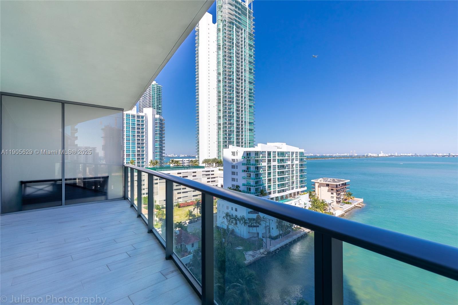 BEST PRICE FOR THIS MODEL UNIT!
Experience elevated living in the heart of Edgewater. This stunning 2-bedroom, 2-bath residence features a sleek open layout and floor-to-ceiling windows framing unobstructed, breathtaking ocean and bay views. A private elevator opens to a spacious foyer, leading to a generous walk-in closet, spa-style bathrooms, and premium appliances. A rare find in city living—this unit includes two dedicated parking spaces, offering exceptional value and convenience. Icon Bay delivers resort-style amenities such as a bayfront pool, tennis courts, and a private movie theater. Perfectly located just a short walk from the Design District, with easy access to I-95, parks, shops, and top-rated dining. This is waterfront luxury at its finest.