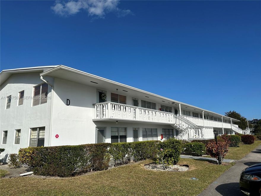 ATTENTION! JUST 1ST MONTH & SECURITY DEPOSIT TO MOVE IN! Charming 1BR/1BA second-floor condo in desirable Berkshire D at Century Village, a premier 55+ community. This well-maintained unit features tile flooring throughout for easy upkeep and an oversized screened balcony with serene water views—perfect for relaxing mornings or evenings. Enjoy resort-style living with an array of amenities including a pool, fitness center, clubhouse, theater, and more. Conveniently located near shopping, dining, and entertainment. Don’t miss this opportunity—schedule your showing today!