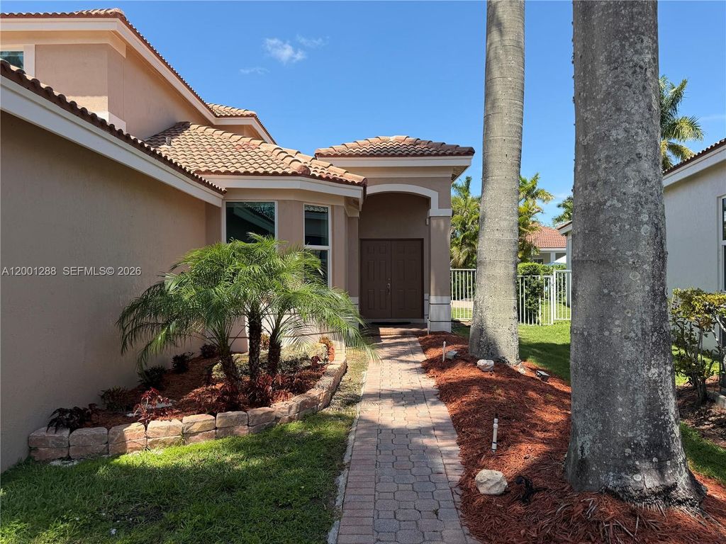 Photo of 1816 Aspen Ln, Weston, FL 33327 (MLS # A12001288)