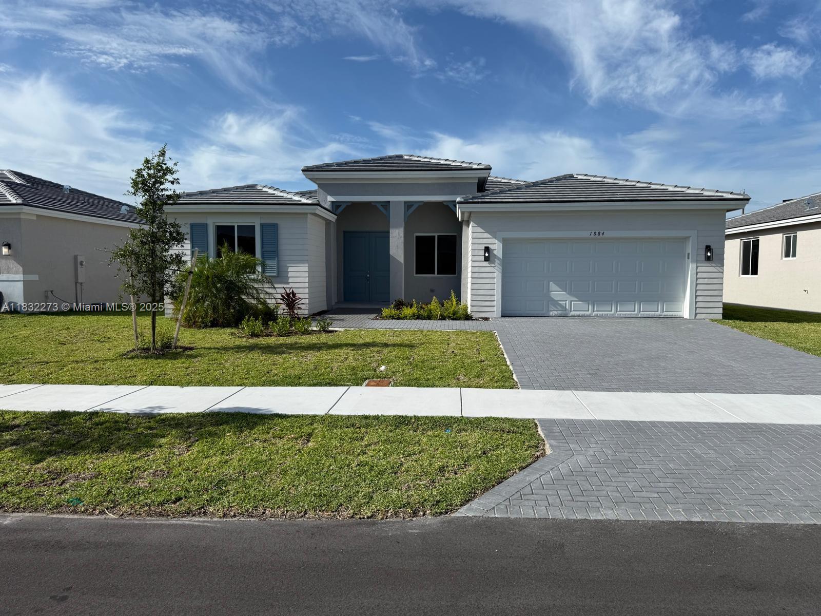 Step into the Oak Model with comfort and style at 1884 NE 1st St, a spacious 5-bed, 3-bath new construction home with 3,108 total SF in a quiet Homestead cul-de-sac. Perfect for large or growing families, this home features a bright open-concept layout, modern kitchen with stainless steel appliances, quartz countertops, an oversized pantry, and generously sized bedrooms. The master suite offers a luxurious bathroom with elegant finishes. The expansive backyard is ideal for a future pool, entertaining, or relaxing. Last 5-bedroom home available on the cul-de-sac—don’t miss out!