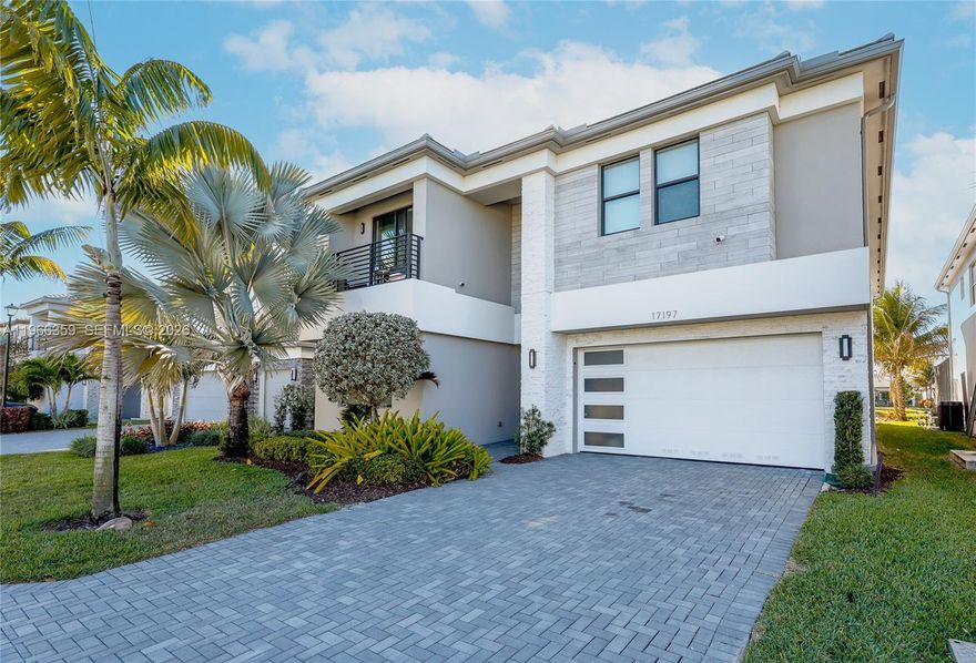 Stunning 5-bedroom, 7-bathroom single-family residence located in the prestigious Lotus community of Boca Raton. This expansive home offers breathtaking waterfront views creating a serene and private setting. A show-stopping pool is nearing completion and just needs final touches to be enjoyed. The open-concept kitchen flows seamlessly into the main living areas, perfect for both everyday living and entertaining. One bedroom on main floor. Laundry room conveniently placed on the second floor. A convenient cabana bathroom provides easy pool access. Set within a beautifully maintained, gated community known for its elegance and resort-style atmosphere, this home offers luxury living at its finest. Community features an incredible clubhouse with resort style amenities including a pool, fitness center, on site dining, sports complex, indoor basketball gym, tennis courts, pickleball courts, game room, and more. Lotus is one of Boca Raton’s most sought after five star resort communities, with on site property management for added convenience. Professional photos being uploaded shortly.