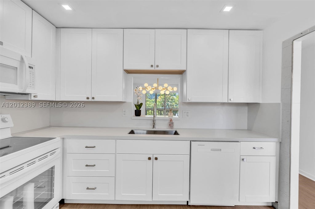 Photo of 218 NE 12th Ave #302, Hallandale Beach, FL 33009 (MLS # A12012389)
