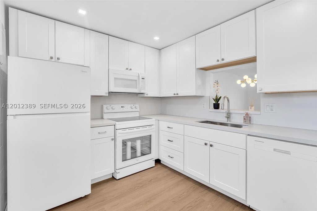 Photo of 218 NE 12th Ave #302, Hallandale Beach, FL 33009 (MLS # A12012389)