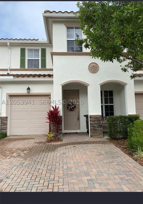 Photo of 4610 Tara Cove Way, West Palm Beach, FL 33417 (MLS # A12053941)