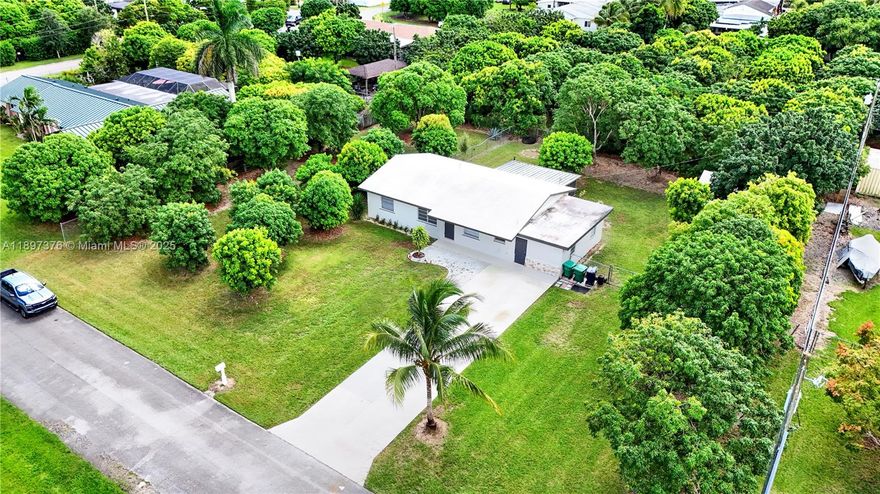 Remodeled single family home in the Redland areas of South Miami Dade County. Home features all tiled flooring with 3 bedrooms, 2 remodeled bathrooms, recently remodeled Kitchen, newer appliances, baseboards, interior/exterior paint, window treatments. Separate front entry for either converting to an efficiency or a teenager to have their privacy. The 21,980 square foot lot features fruit bearing trees (over 20 trees) and plenty of space for a boat/RV/Trailer, etc and a concrete driveway for multiple car parking. This property is ready for the right buyer to call it home and enjoy get togethers. No HOA for this property and centrally located with close proximity to the Florida Keys and North to tourist areas.