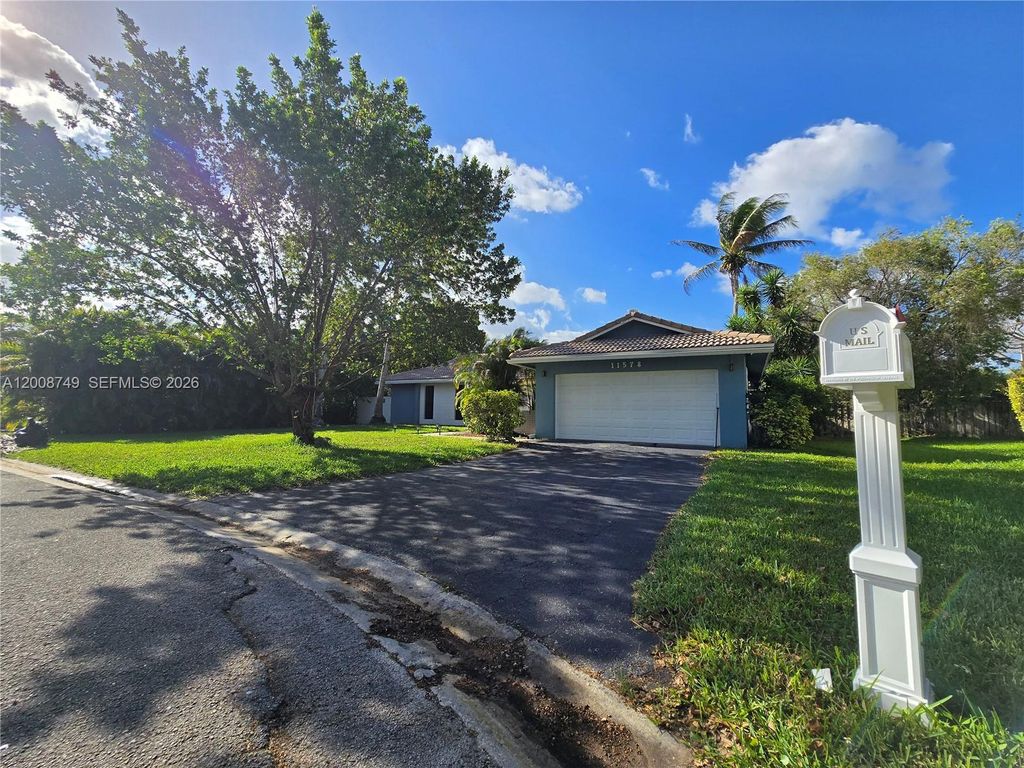 Photo of 11578 NW 39th Pl, Coral Springs, FL 33065 (MLS # A12008749)