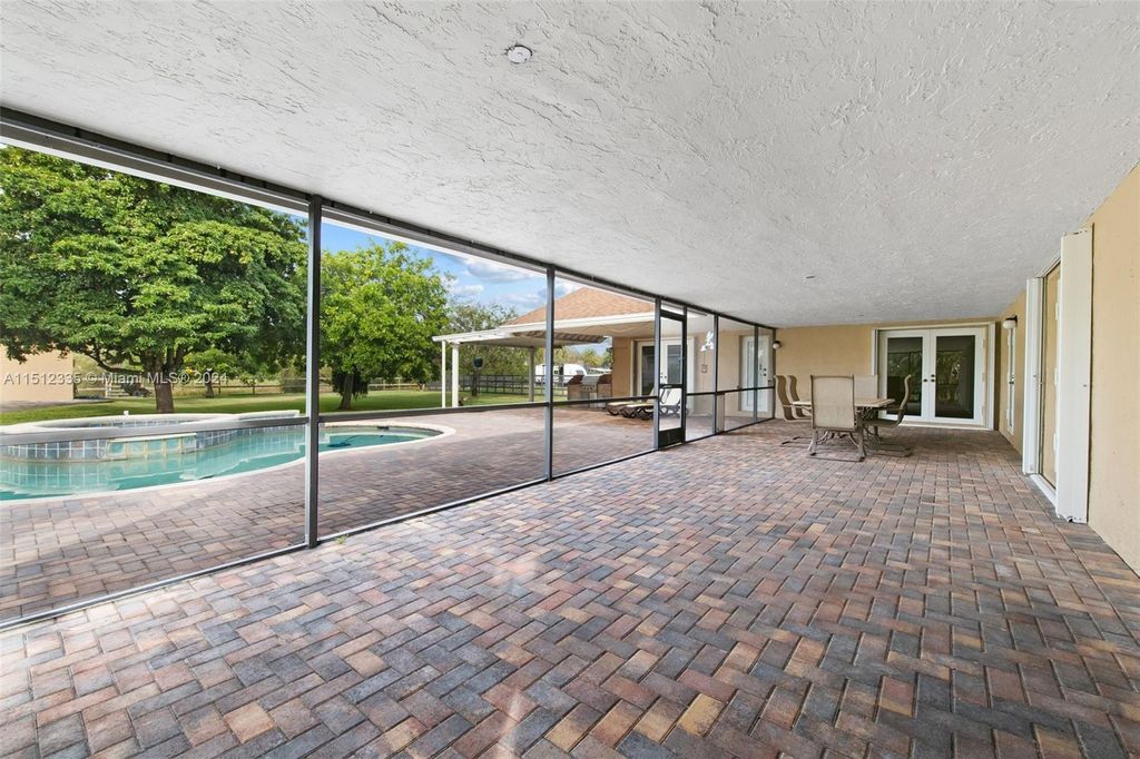 Photo of 5901 SW 164th Ter, Southwest Ranches, FL 33331 (MLS # A11512335)