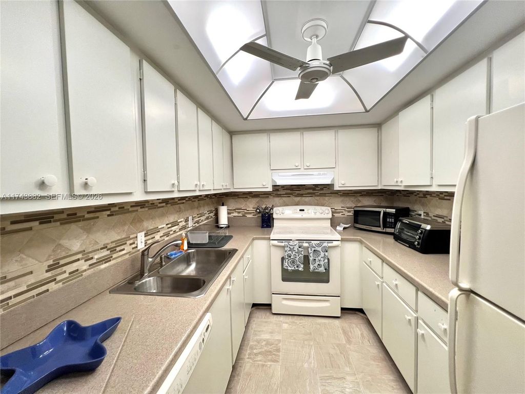 Photo of 125 Ocean Ave #402, Palm Beach Shores, FL 33404 (MLS # A11743882)