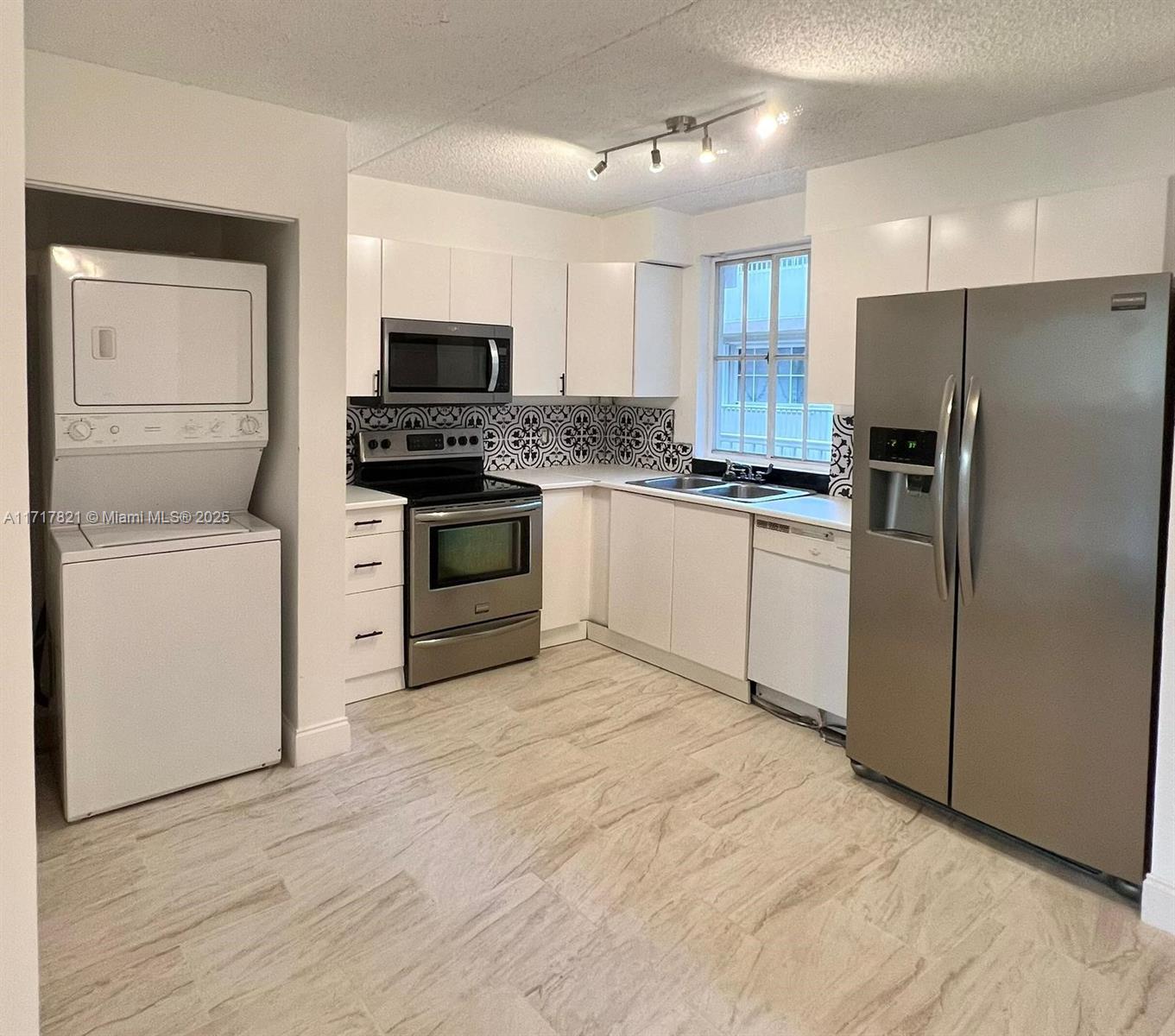 Welcome to an exclusive opportunity to become the proud owner of a recently remodeled and incredibly spacious 3 bedroom, 2 bath Condo in the highly sought-after Miami Lakes, FL. This remarkable property is ready for you to move in. This turn-key property features beautiful ceramic floors, a fully remodeled kitchen and bathrooms, sizable bedrooms, and in-unit washer/dryer. Located on the 2nd floor with elevator access. Close to major roads, highways, and restaurants. 1 parking spot plus guest parking. No rental restrictions. Great investment. Don't miss out, contact us now!