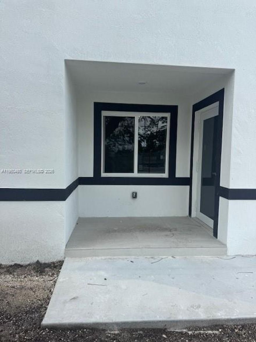 UNDER CONSTRUCTION. SPACIOUS CORNER HOME. 3 BEDROOM 2.5 BATH. STEP INSIDE TO ELEGANT TILE FLOORING THROUGHOUT, MODERN WOOD KITCHEN CABINETS AND STAINLESS STEEL APPLIANCES. HIGH IMPACT WINDOWS AND DOORS PROVIDING BOTH SAFETY AND ENERGY EFFICIENCY. PROPERTY TO BE COMPLETED APPROXIMATELY MARCH, 2026.