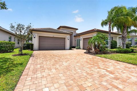 Photo of 11087 SW Ivory Springs Ln, Port St Lucie, FL 34987 (MLS # A12026853)