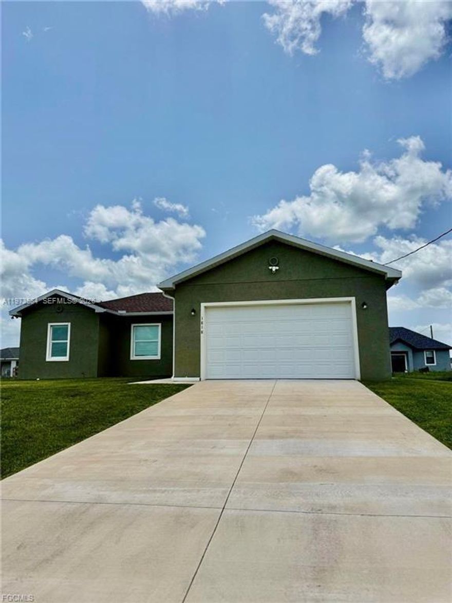 Spectacular, almost-new home built in late 2023! 1 story single family residence is located in the desirable community of Port LaBelle, Florida. Featuring an open-concept floor plan with vaulted ceilings and a spacious living area, this home offers 4 bedrooms, 2 bathrooms, and a 2-car garage with an extended driveway that accommodates up to 4 additional cars. The bedrooms include large walk-in closets, and the primary suite boasts a double vanity and a beautifully tiled shower. The kitchen features granite countertops, a center island, soft-close cabinetry, and a complete stainless steel, energy-efficient appliance package. With approximately 1,500 sq. ft. under air and over 2,100 sq. ft. total, the home also includes a covered terrace and a generous backyard-perfect for outdoor enjoyment.