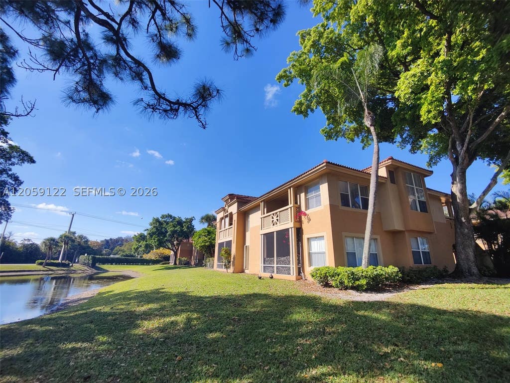 Photo of 4871 Via Palm Lks #701, West Palm Beach, FL 33417 (MLS # A12059122)