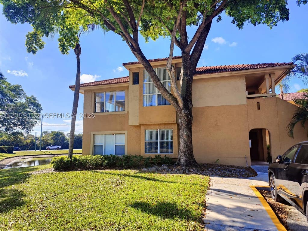 Photo of 4871 Via Palm Lks #701, West Palm Beach, FL 33417 (MLS # A12059122)