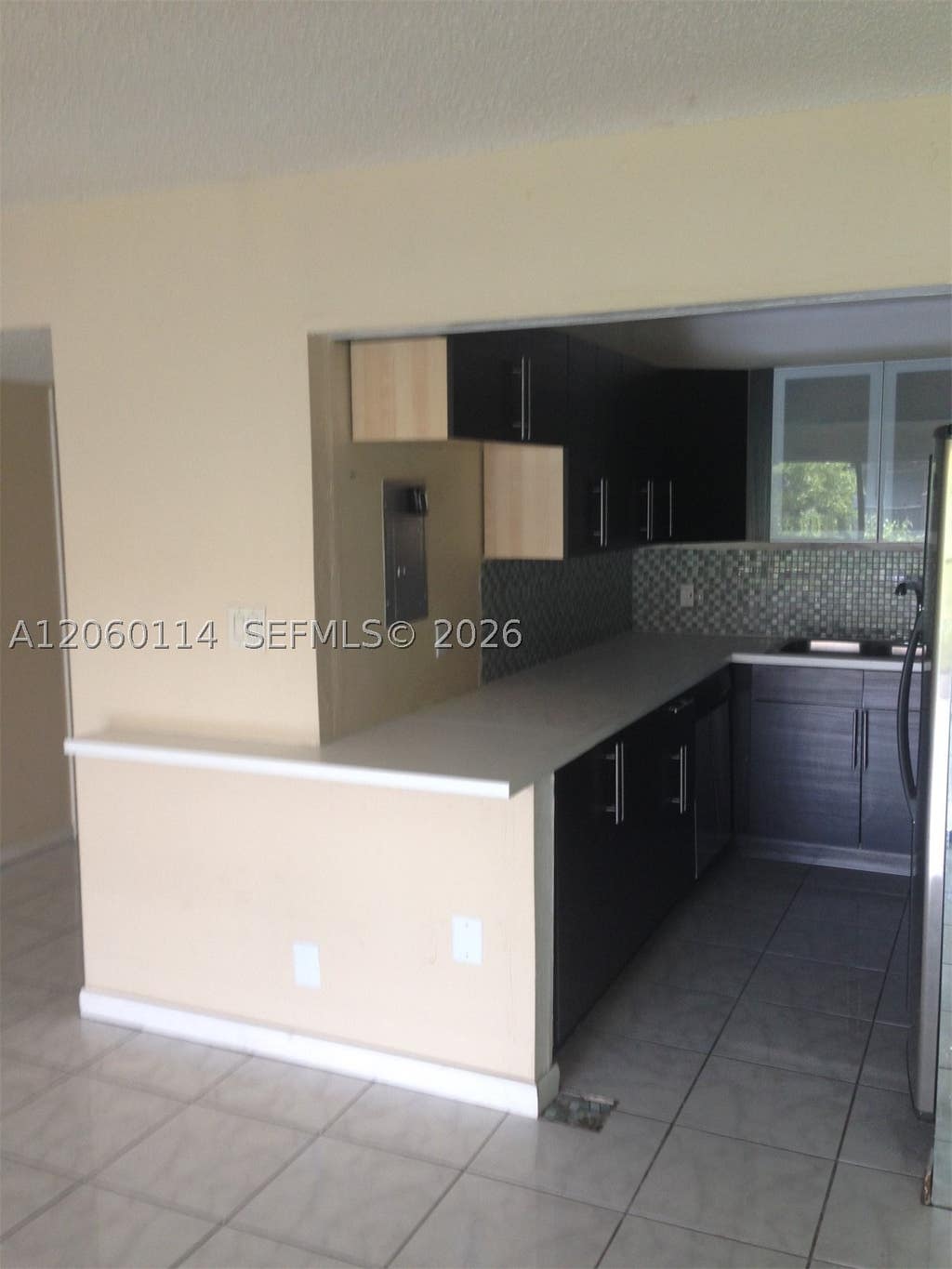 Photo of 6101 N Falls Cir Dr #409, Lauderhill, FL 33319 (MLS # A12060114)