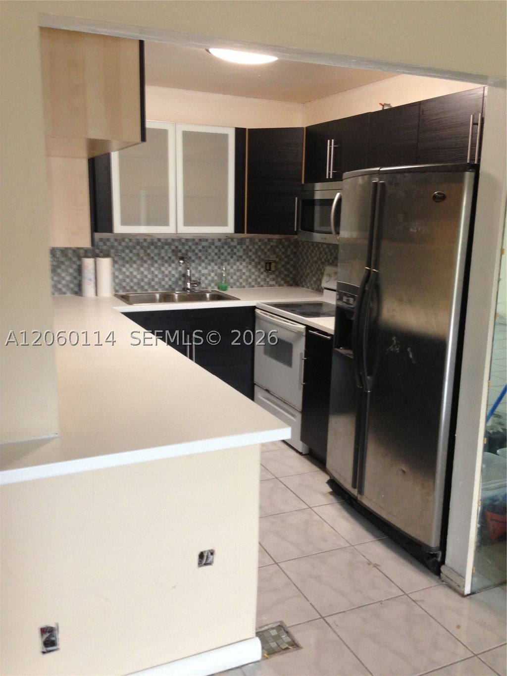 Photo of 6101 N Falls Cir Dr #409, Lauderhill, FL 33319 (MLS # A12060114)