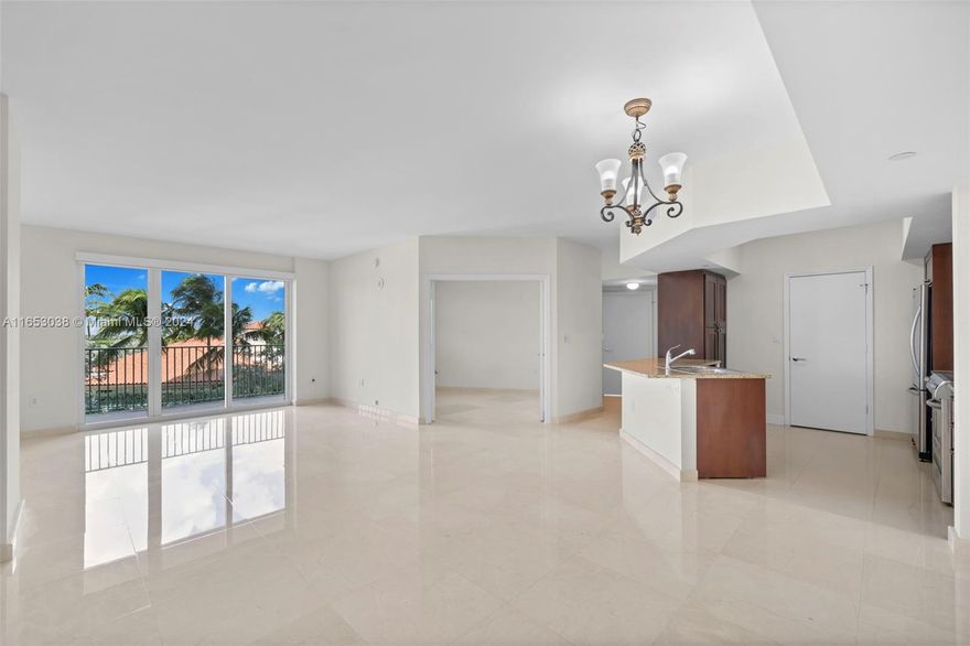 Come experience luxury living in this 3-bedroom, 3-bathroom unit at Turnberry Village. This unit offers 1,500 sqft of sophisticated living space with elegant marble floors throughout the living areas and upgraded kitchen cabinets. Additionally, the unit has two dedicated parking spots and a large locked storage space for added convenience. Enjoy resort-style amenities including a sparkling pool, modern fitness center, relaxing spa, and 24-hour security. The spacious balcony offers stunning westerly views of Aventura. Ideally located just steps from Aventura Mall, beaches, and fine dining, this unit is perfect for year-round living or a vacation getaway. Don’t miss out on this prime opportunity!