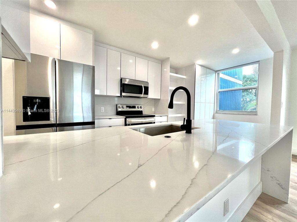 Photo of 4200 Hillcrest Dr #220, Hollywood, FL 33021 (MLS # A11443569)