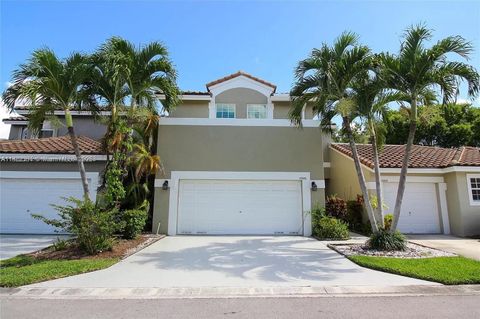 Photo of 12056 NW 56th St, Coral Springs, FL 33076 (MLS # A11822384)