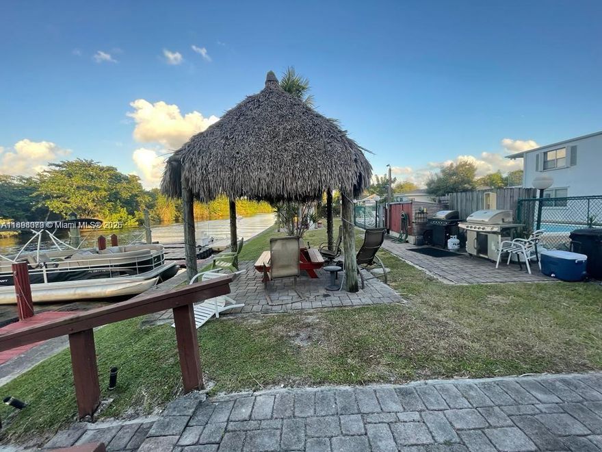 cozy 2/1 on the water. quiet neighbors. Tiki hut with bbq , pool. excellent location. call listing agent for showings. water included