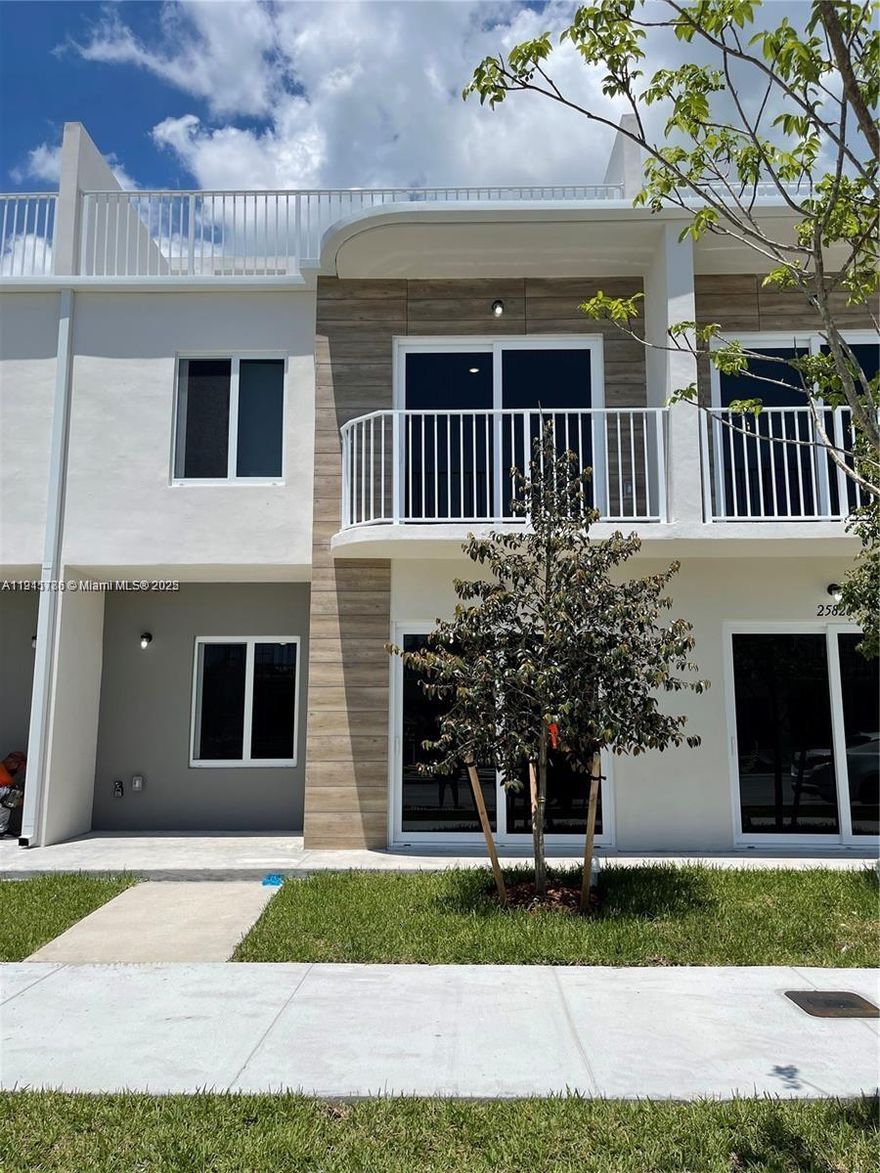 Stunning modern townhome featuring 4 bedrooms, 3.5 baths, and a spacious terrace. Ideally located with easy access to major routes, this energy-efficient home boasts top-of-the-line appliances, impact-resistant windows and doors, and sleek contemporary finishes.  A must-see! Tenant occupied until 7/31/26. All information is approximate and not warranted or guaranteed.