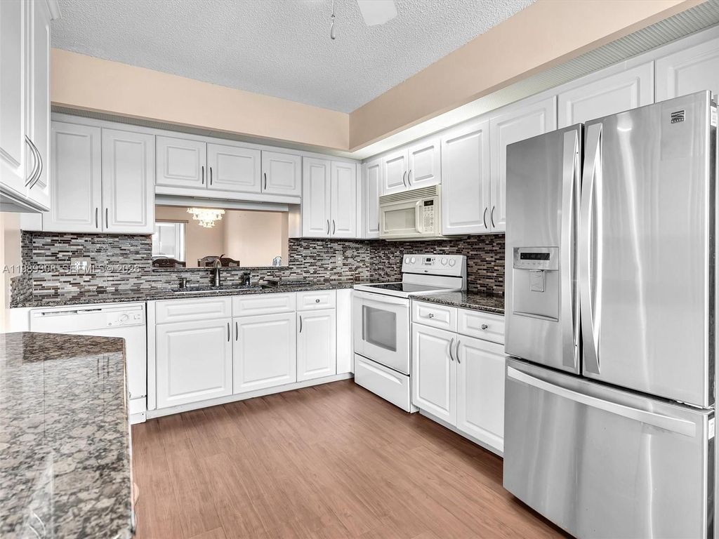 Photo of 800 SW 125th Way #407O, Pembroke Pines, FL 33027 (MLS # A11989308)