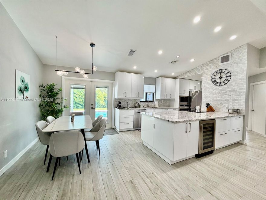 Fully remodeled and beautifully furnished, this stunning 3-bd, 2-bath home features a large private backyard with a heated pool***Ideally located just minutes from the beach, restaurants, shops, Publix, and Dania Pointe***Enjoy a brand-new modern kitchen with elegant cabinets, granite countertops, and stainless steel appliances, along with fully remodeled bathrooms, new flooring throughout, and a bright open layout that creates a welcoming atmosphere***Includes a brand-new washer & dryer inside the house, plus an additional refrigerator and extra washer & dryer in the garage. The garage also features an electric car charger for your convenience***Pool maintenance (weekly) and landscaping service (twice a month) are included in the rent — no additional cost for the tenant!