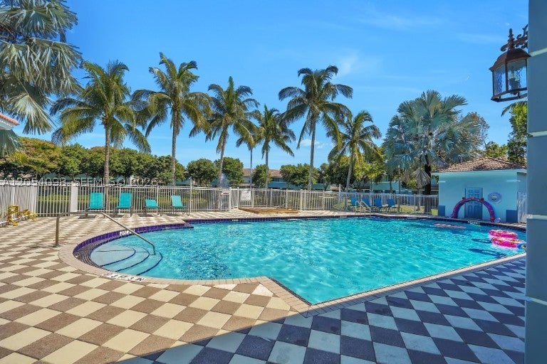 Photo of 1942 Alamanda Way, Riviera Beach, FL 33404 (MLS # A12054098)