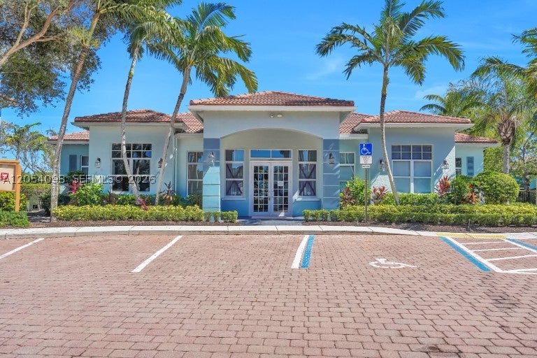 Photo of 1942 Alamanda Way, Riviera Beach, FL 33404 (MLS # A12054098)