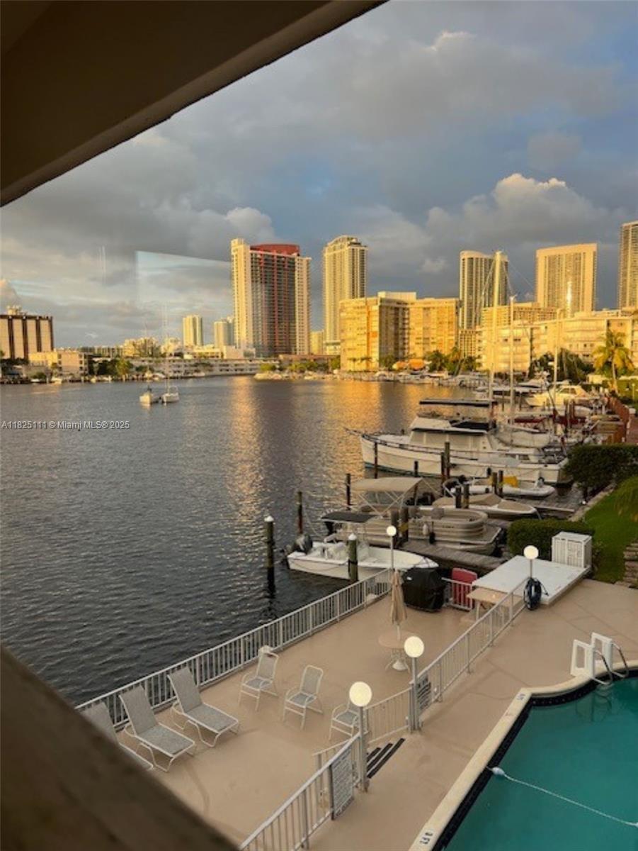 Spectacular view - Directly on Intracoastal. Location Location Location ! The perfect pied a terre. Corner unit with open balcony. Dock available. Great opportunity. A Boaters Dream with Docks Available (waiting list). Maximum 35ft boat, water & electric included for dock. Fabulous pool and clubhouse. LOW HOA. No assessments. 20% of residents (11 units) are allowed to be younger than 55. Currently only one unit is under 55.