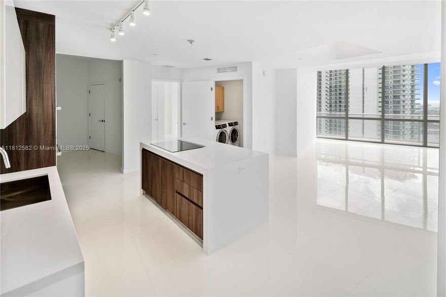 This spectacular, 2 bedrooms + den 3 full baths unit in Paramount World Center features 10 ft ceilings, European kitchen, lots of natural light with breathtaking panoramic city, bay and intercostal views. This is one of the few units with the extended wraparound balcony. Paramount World Center offers exquisite amenities, including five pools, gym with boxing ring, game room, golf simulator, half basketball court, children’s play room, soccer field, tennis, spa, food, market, and so much more. This is a pet friendly building located in the heart of downtown Miami, steps away from the Brightline train station, Port of Miami, and minutes to the Miami airport, Wynwood, and Miami Beach.