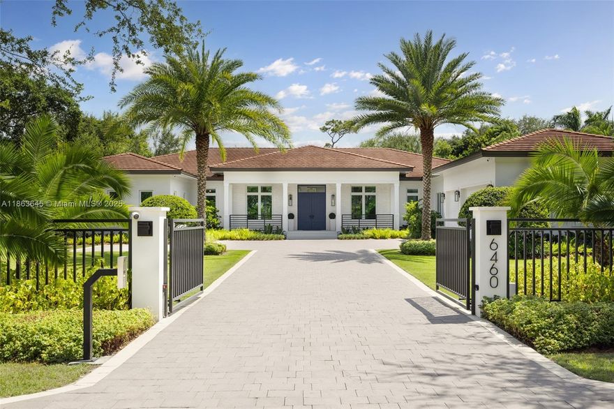 This residence radiates style and quiet luxury. Custom design in collaboration with Hollub Homes, it reflects exceptional craftsmanship, timeless design, and thoughtful livability. On an ultra-quiet street, this home features glass walls with captivating views to a perfectly curated and manicured pool lawn area, sprawling palms, and a Podocarpus hedge that perfectly lines the perimeter.  An open kitchen with dual islands anchors everyday life and entertaining. The bedroom wing keeps the family connected, with a dedicated lounge area for time with friends. The smartly designed professional and wellness wing includes a private office, gym with separate entrance, flex workspace, and laundry room. Every detail was intentional—elevated yet welcoming, from first impression to everyday living.