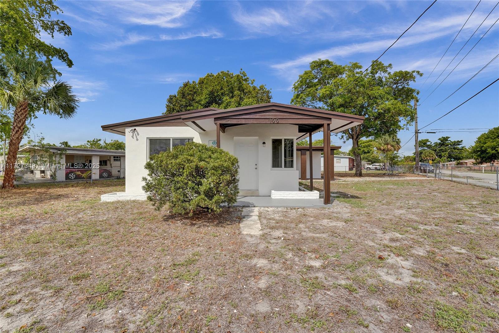 Great recently renovated single-family home with 2 bedrooms and 1 bathroom, centrally located in Fort Lauderdale. This charming house sits on a large corner lot and is fully fenced. Features a nice open kitchen with lots of natural light, terrazzo floors throughout, and central AC. Utility room with washer and dryer. Pets are allowed with restrictions (must be spayed/neutered and have current vaccinations and vet records). A non-refundable pet fee of $250 is required. $100k Tenant Liability Insurance is required before move-in.