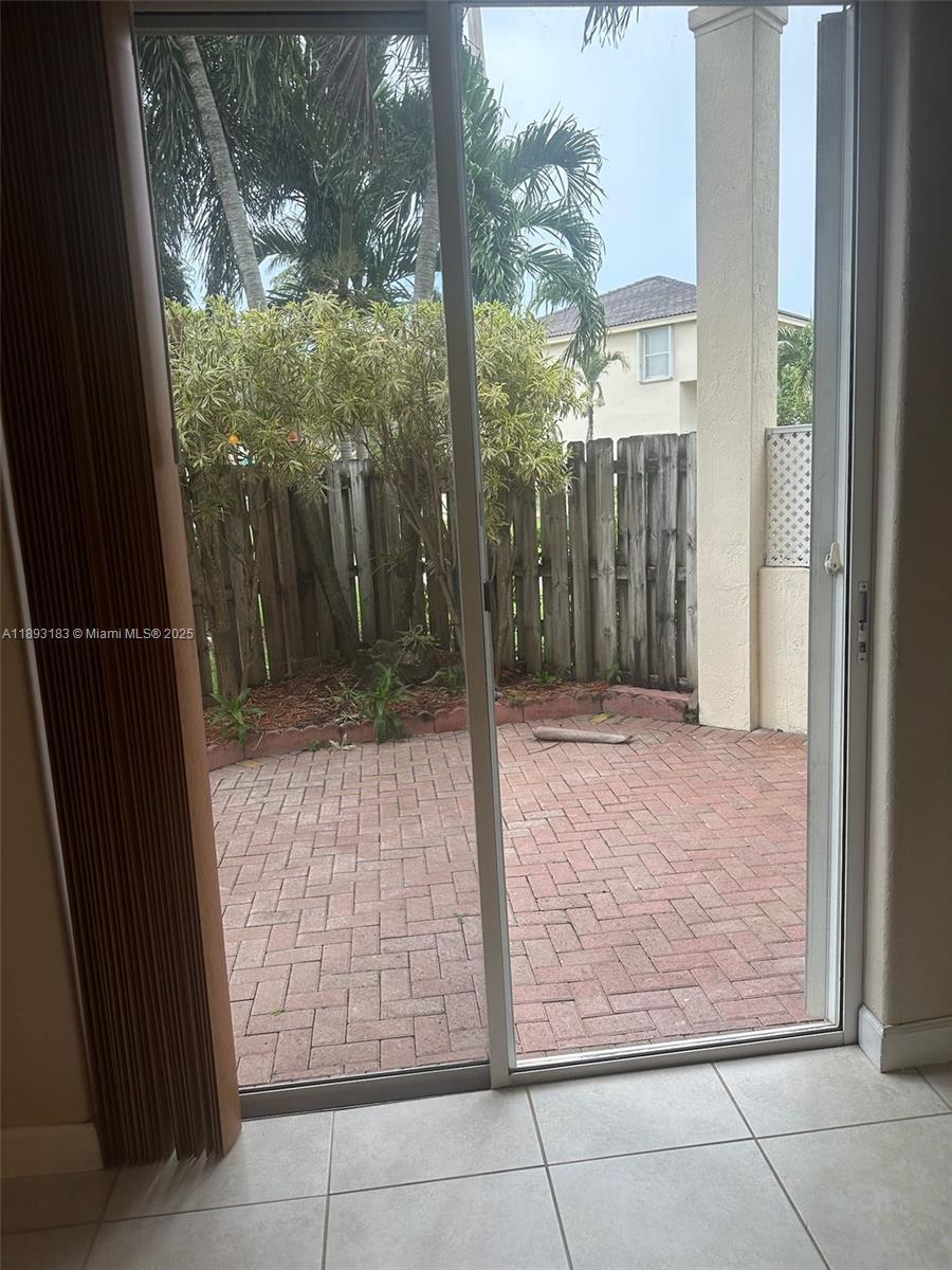 DORAL SOUTHEAST PATIO-HOM - Residential Lease