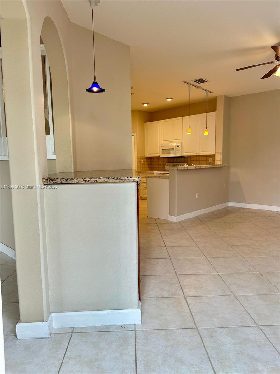 DORAL SOUTHEAST PATIO-HOM - Residential Lease