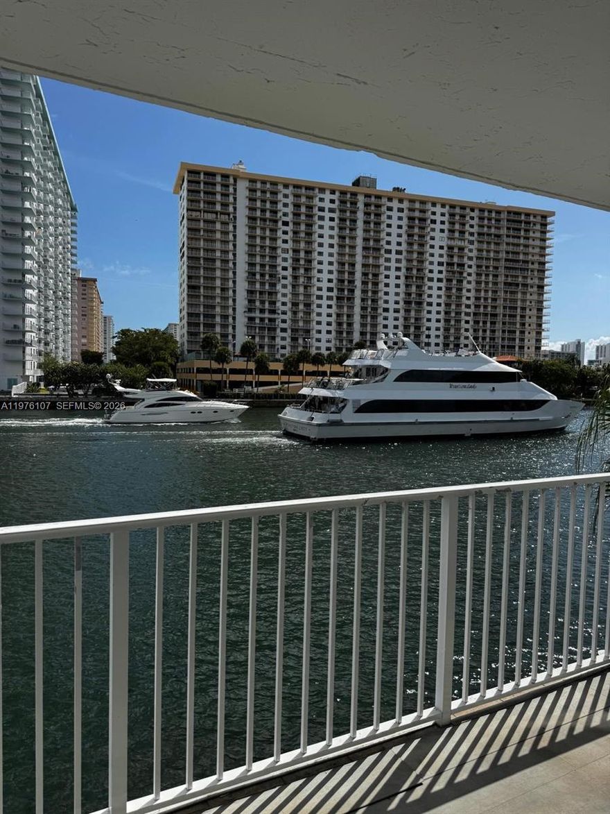 Waterfront 1BR with private balcony in desirable Eastern Shores – minutes to Sunny Isles Beach and Aventura Mall. Bright and spacious waterfront apartment featuring a renovated kitchen with stainless steel appliances, quartz countertops, and a breakfast bar opening to the living and dining area. Modern flooring throughout, large bedroom with walk-in closet, and updated bathroom with contemporary finishes. Enjoy relaxing canal and waterfront views from your private balcony. The building offers a beautiful waterfront pool, peaceful surroundings, and assigned parking. Excellent location in Eastern Shores close to beaches, shopping, dining, and major roads. Waterfront units in this area rent quickly. Available now – easy to show.