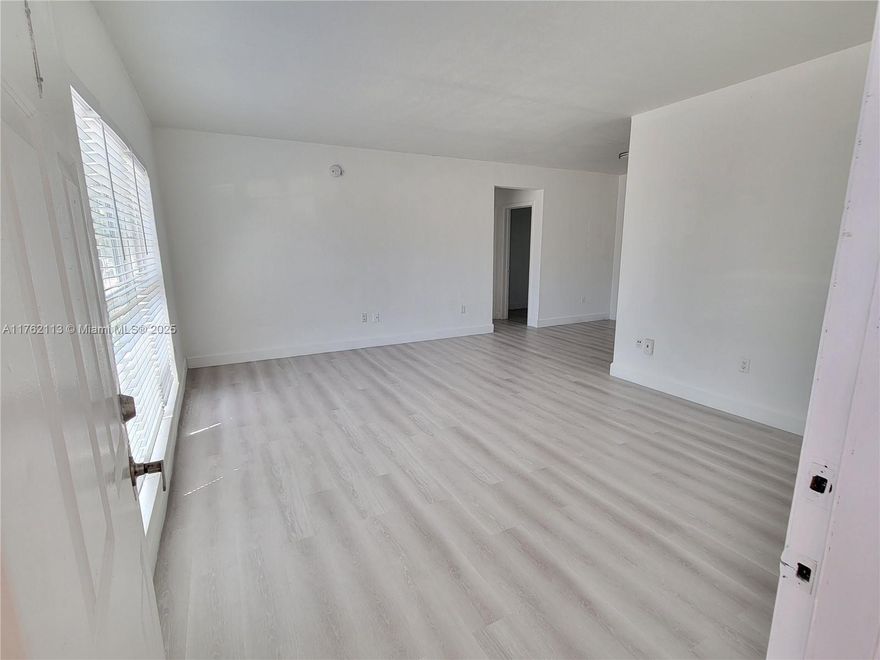 Just 2 blocks to the beach ! Large modern apartment. New floors, high impact windows, spacious kitchen, new stove and fridge, plenty of closet space. Community laundry, waterfront common area. Secured garden style building, camera surveillance. Pets allowed. Association approval required. No short term rentals. Vacant, easy to show. Building already has the 50 years re-certification.