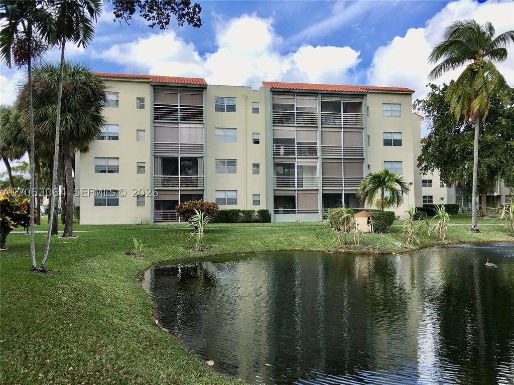 Photo of 1800 SW 81st Ave #1118, North Lauderdale, FL 33068 (MLS # A12053064)