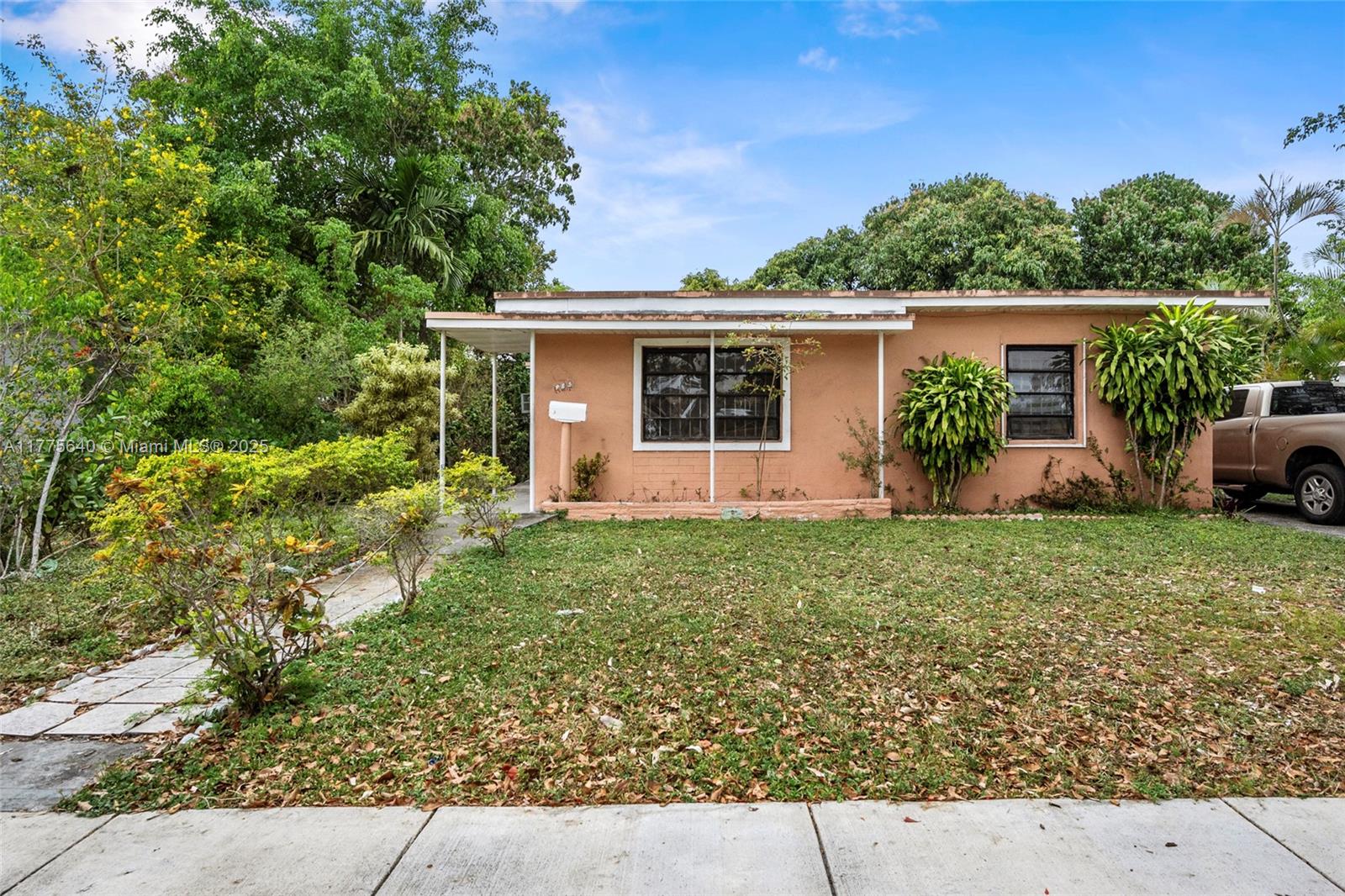 Investor Special ! This 3-bedroom, 2-bathroom home is a great investment opportunity with tons of potential. One of its standout features is the dual entrance doors, giving you flexibility for different living arrangements or even rental income. Plus, one of the bedrooms has its own private exterior entrance, making it perfect for a separate suite, home office, or guest space. With a functional layout and unique setup, this property has plenty of appeal for tenants and future value growth. With a large backyard filled of mango and other fruit trees with endless possibilities in an up and coming neighborhood ACT FAST THIS PROPERTY WILL NOT LAST