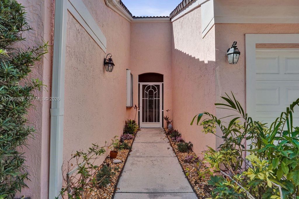 Photo of 274 Coral Trace Ln, Delray Beach, FL 33445 (MLS # A11959128)