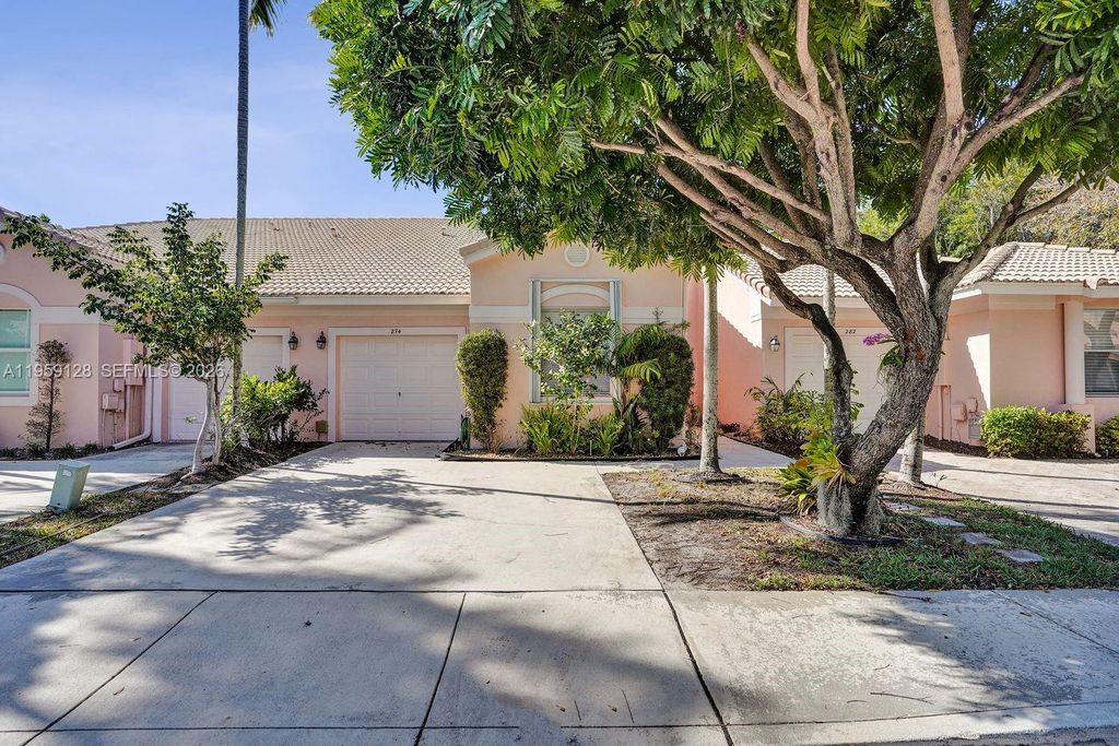 Photo of 274 Coral Trace Ln, Delray Beach, FL 33445 (MLS # A11959128)