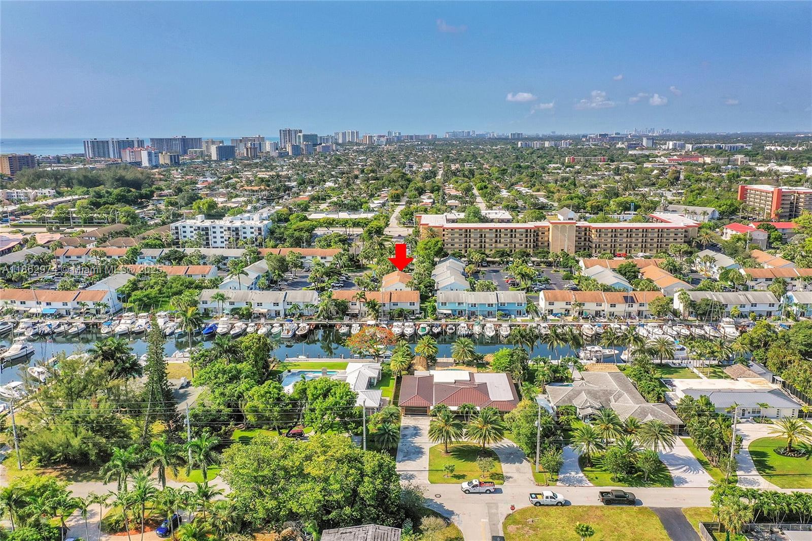 Updated 2-Bed, 2.5-Bath Townhome in Waterfront Community—1.5 Miles to the Beach!
Enjoy coastal living in this bright open layout with porcelain floors, modern finishes, plantation shutters, french doors, and a private fenced patio. Upstairs offers a full-size washer/dryer and attic storage; In addition to the storage under the stairs. Park right in front of your door with 2 assigned spaces plus guest parking. Community features pool and optional dock space with no fixed bridges to the ocean via the Hillsboro Inlet. Dock ownership is separate, with priority given to Sun Harbor owners for renting or purchasing. This is a Fee simple townhome (not a condo) with a low $218 monthly fee which covers water, sewer, trash & landscaping. Eligible for FHA and No special assessments!