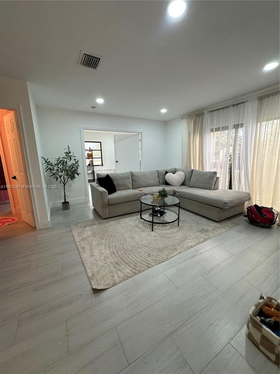 Discover urban living at its finest with this centrally located 3-bedroom, 3-bathroom apartment, one of the few spacious 3/3 units available in the association. PET FRIENDLY! This stunning residence boasts new porcelain floors and modern lighting, creating a sleek and contemporary atmosphere. Enjoy the convenience of a brand new washer and dryer in your home. Perfectly situated for accessing nearby amenities, this apartment offers both style and practicality in a vibrant neighborhood. Don't miss the opportunity to make this your new home!